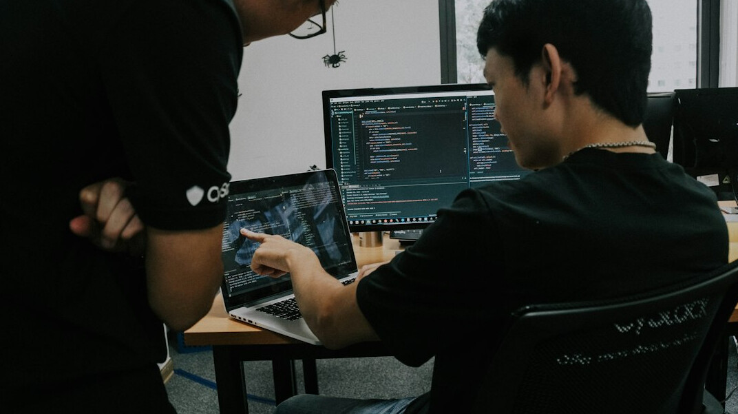 mentor helping student with code