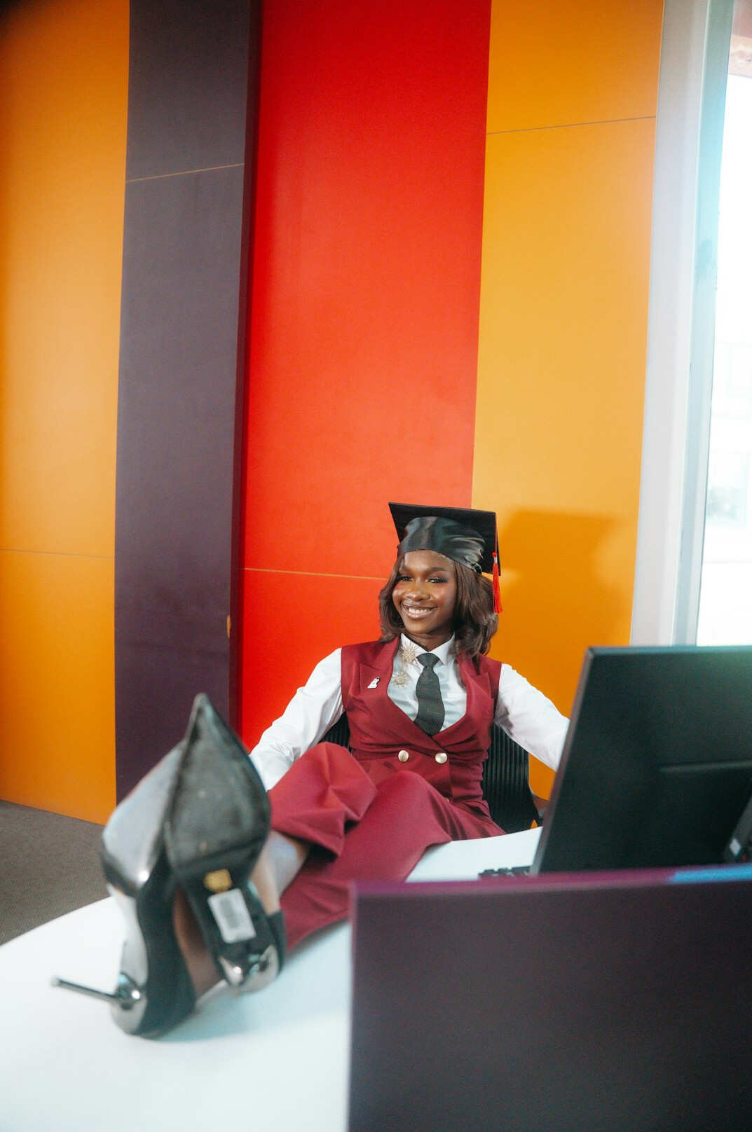 graduation cap on laptop